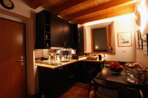 Kuchyň nebo kuchyňský kout v ubytování The Cozy Nest - Bellano
