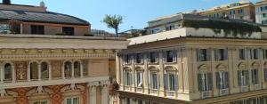 a group of buildings next to each other at Riva Superior in Genoa
