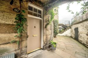 an entrance to a building with a door at Hamilton Place - Beautiful and central city apartment with private entrance sleeps 4 in Edinburgh