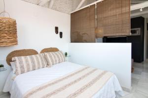 Posteľ alebo postele v izbe v ubytovaní Riad Alhambra