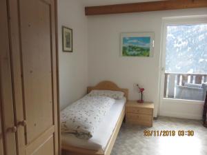 Postel nebo postele na pokoji v ubytování Albergo Somont
