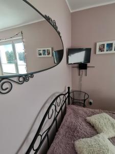 TV a/nebo společenská místnost v ubytování Anna
