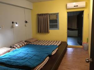 Letto o letti in una camera di 稻禾民宿