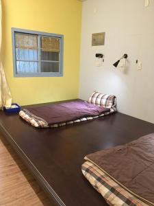 Letto o letti in una camera di 稻禾民宿