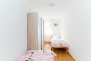 Ліжко або ліжка в номері Apartment Budimir