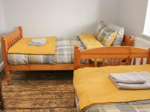 Voodi või voodid majutusasutuse 1 Royal Oak Cottages toas