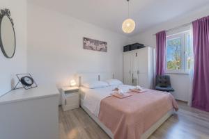 Postel nebo postele na pokoji v ubytování Villa Tara ZadarVillas + 37 fotografií