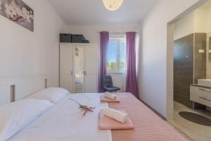 Postel nebo postele na pokoji v ubytování Villa Tara ZadarVillas