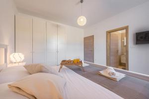 Postel nebo postele na pokoji v ubytování Villa Tara ZadarVillas