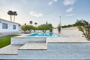 Swimmingpoolen hos eller tæt på Casa LLimona: La casa perfecta para tus vacaciones.