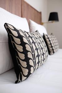 Postel nebo postele na pokoji v ubytování Parkhotel Obermenzing