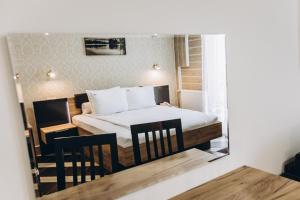 Voodi või voodid majutusasutuse Hotel Adrenalin toas
