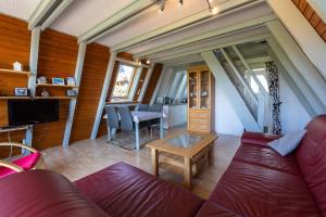 Posezení v ubytování Ferienwohnpark Immenstaad am Bodensee Nurdachhaus Typ 7 ND 01