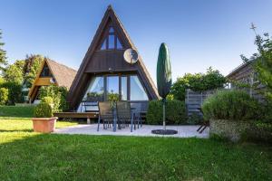 Zahrada ubytování Ferienwohnpark Immenstaad am Bodensee Nurdachhaus Typ 7 ND 01