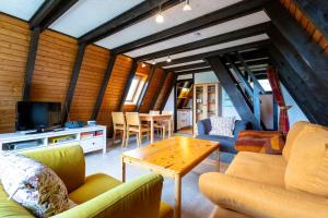 Posezení v ubytování Ferienwohnpark Immenstaad am Bodensee Nurdachhaus Typ 7 ND 28