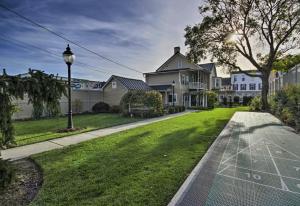 a house with a street light in the grass at Downtown Bucher House in Hanover