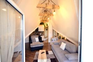 Posezení v ubytování C l e a n&C o z y Apartmani Divcibare