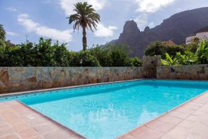 Bazén v ubytovaní Vivienda Vacacional La Finca alebo v jeho blízkosti