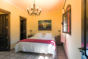 Posteľ alebo postele v izbe v ubytovaní Vivienda Vacacional La Finca
