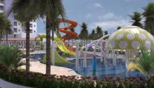 een zwembad met een glijbaan in een resort bij Salinas Exclusive Resort in Salinópolis