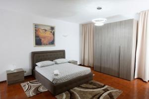 Agriturismo Villa Paradiso Esotico客房内的一张或多张床位
