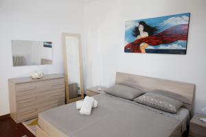 Agriturismo Villa Paradiso Esotico客房内的一张或多张床位
