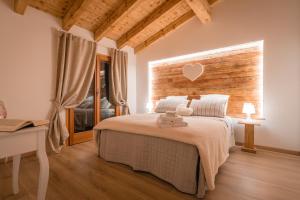 Ένα ή περισσότερα κρεβάτια σε δωμάτιο στο Alla Vecchia Contrada B&B