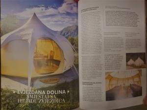 een pagina van een boek met een tent bij Glamping Zvjezdana dolina in Andrijevica