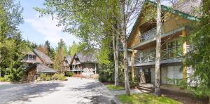 a house with a driveway in front of it at Valhalla Vacations at Whistler in Whistler