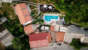 an overhead view of a house with a swimming pool at Boutique B&B Mali Pariz in Crikvenica