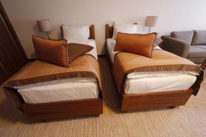 En eller flere senge i et værelse på Apartman Tijana - privatni apartman B133 hotel Vučko