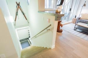 Uma cama ou camas num quarto em Sunpath by Outpost Whistler