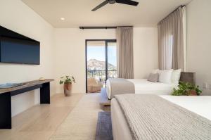 Postel nebo postele na pokoji v ubytování 1 Homes Preview Cabo