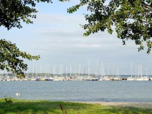 a view of a marina with boats in the water at 8 person holiday home in Gelting in Gelting