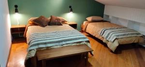 Letto o letti in una camera di Ñañas Hostel