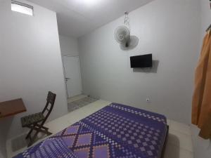 Llit o llits en una habitació de Rumah Rahman Syari'ah