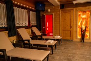 Posezení v ubytování Hotel Al Pelmo Wellness