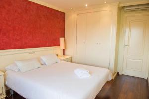 Posteľ alebo postele v izbe v ubytovaní Splendid Gaudi Mercat del Ninot Apartment