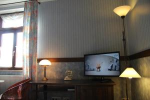 TV a/nebo společenská místnost v ubytování Hotel BB Bahnhof Bertsdorf