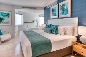 En eller flere senger på et rom på Oceans Mooloolaba