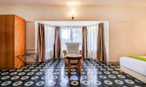 RR INN Group Of Hotels的休息区