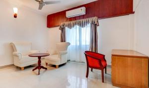 RR INN Group Of Hotels的休息区