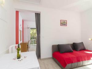 Ένα ή περισσότερα κρεβάτια σε δωμάτιο στο Apartments Matusko