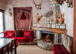 Posezení v ubytování Hotel Gigilos Omalos