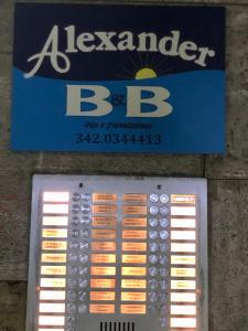 a sign for abaader bbc on a wall at B&B Alexander in Naples