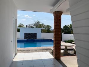 a view of a swimming pool from a house at Lofts Zaragoza in Valles