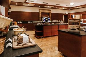 Kuchyň nebo kuchyňský kout v ubytování Hotel Der Stockinger