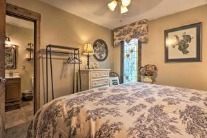 a bedroom with a bed and a window at Riverfront Couples Retreat in Smoky Mountains! in Townsend