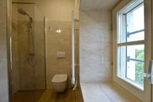 Koupelna v ubytování App & Rooms Juraga