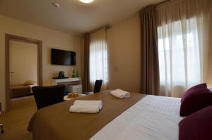 Postel nebo postele na pokoji v ubytování App & Rooms Juraga